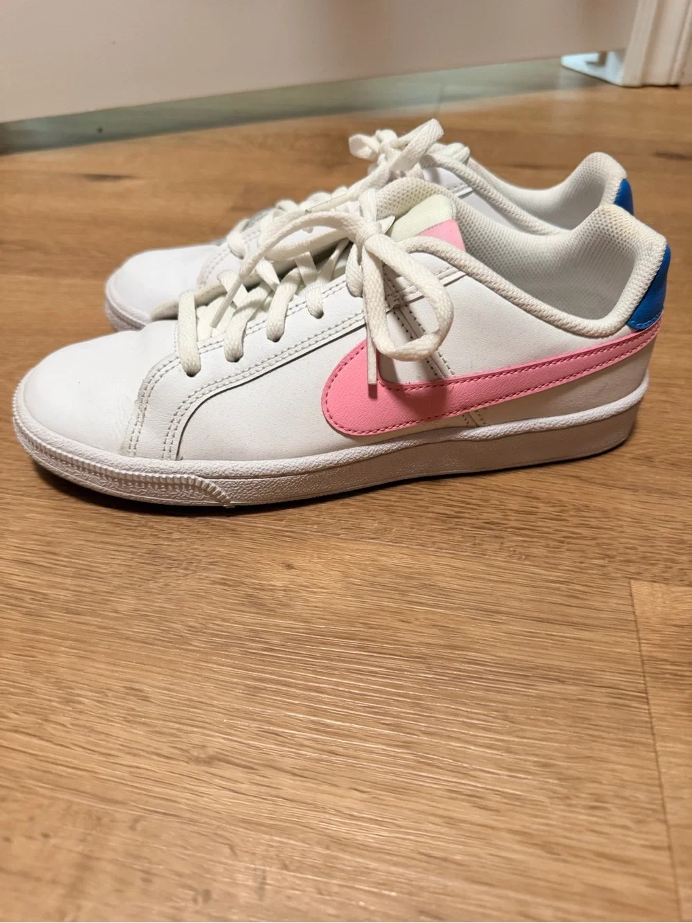 Nike Court Royale White Sneakers with Pink Swoosh and Blue Heel Tab